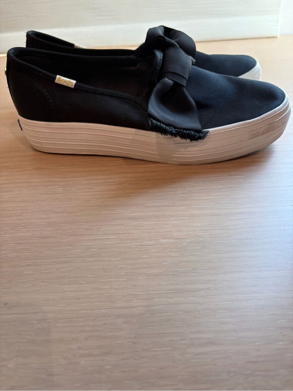 Keds Black Platform Slip-On Sneakers with Bow Accent